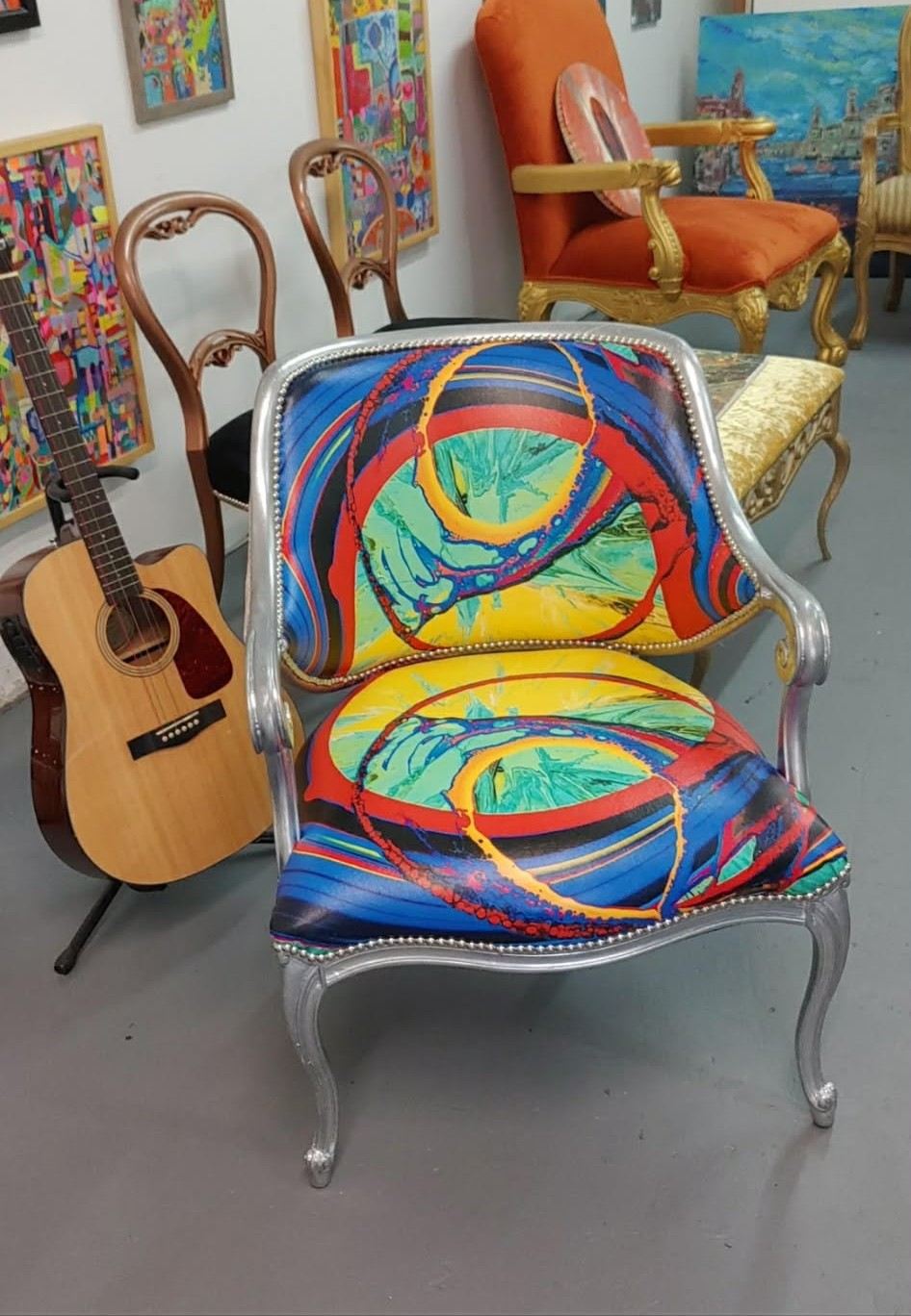 Louis-style armchair with silver frame in spin-painted upholstery